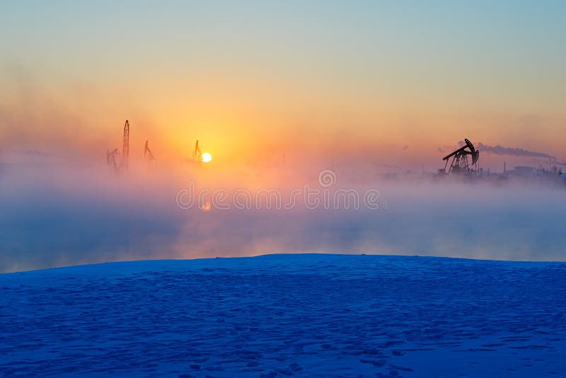 The derrick and pumping units lakeside