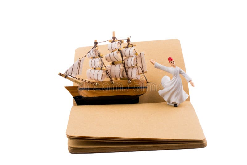 Derviscio di Sufi e una nave su un taccuino immagini stock libere da diritti