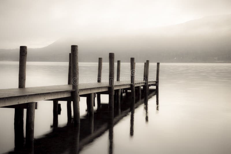 Mountain lake with a jetty stock photo. Image of landscape - 19672392
