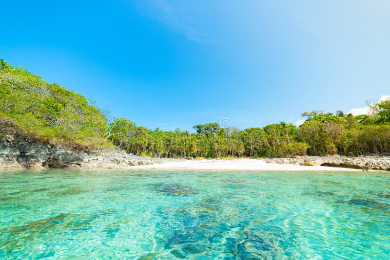 Desert beach viewed from the sea, turquoise blue water, tropical paradise, travel destination, Kei Island, Moluccas, Indonesia, no royalty free stock photography Desert beach viewed from the sea, turquoise blue water, tropical paradise, travel destination, Kei Island, Moluccas, Indonesia, no royalty free stock photography
