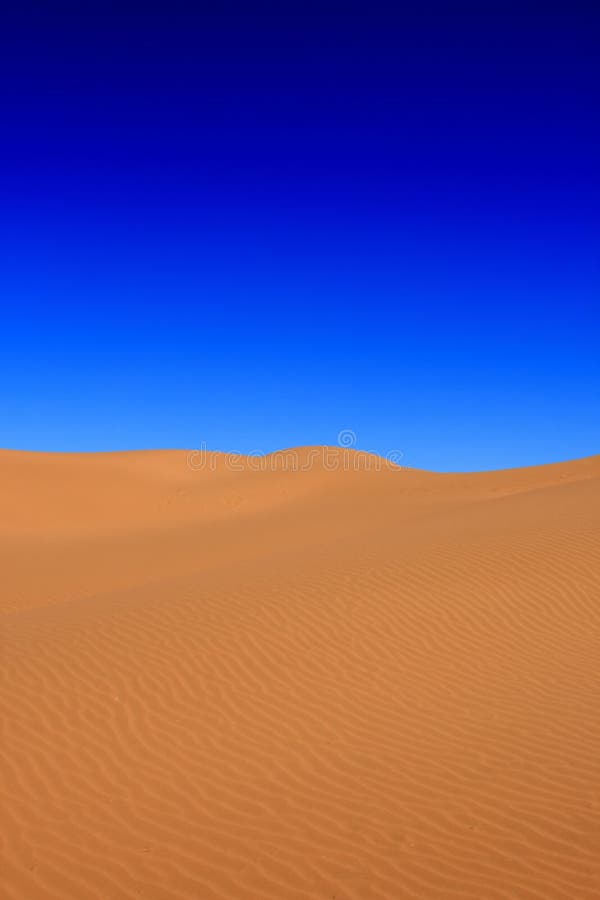 Desert with a blue sky stock image. Image of sunny, dead 16542501