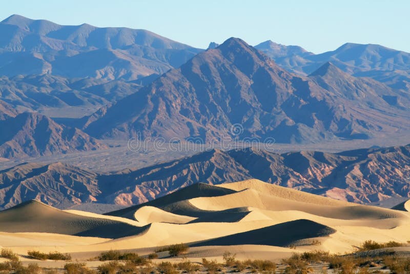 Desert Dunes and Mountains