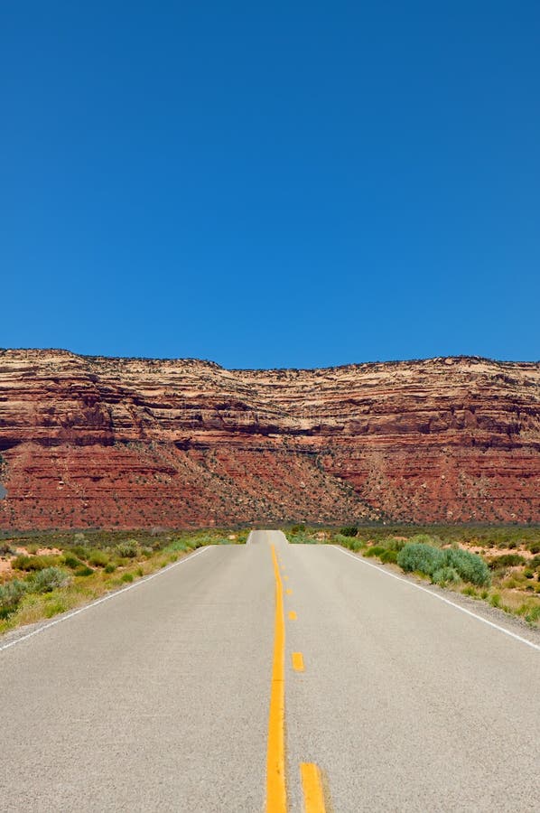 Desert highway leading into mountains