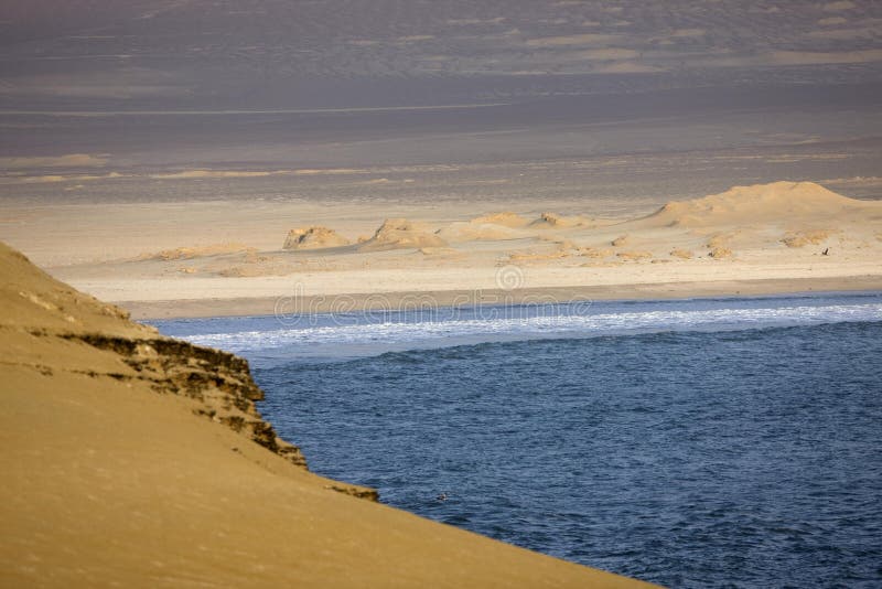Desert and Ocean, Landscape in Paracas National Park, Peru Stock Photo