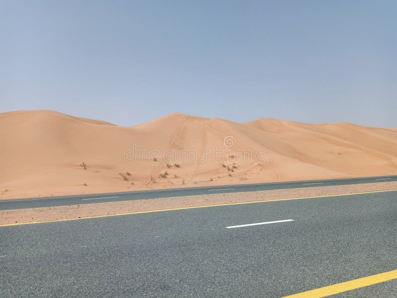 Desert and the road dubai stock photo. Image of road 229474966