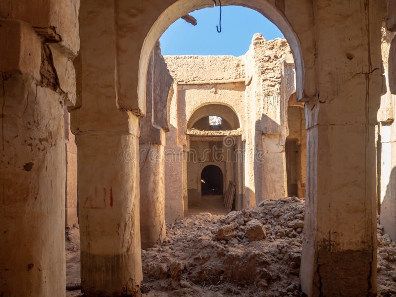 Desert town of Mhamid, Morocco village with sand dunes and old muslim mosque in north Africa, old narrow streets, traditional clay