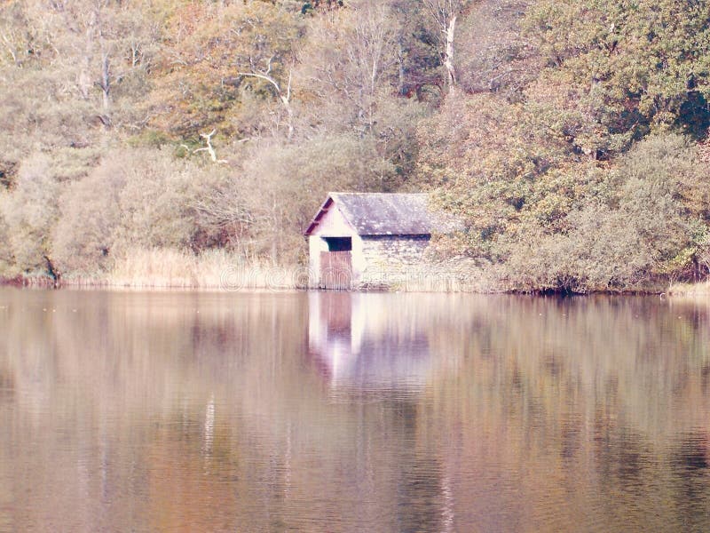 Deserted boathouse by the lake