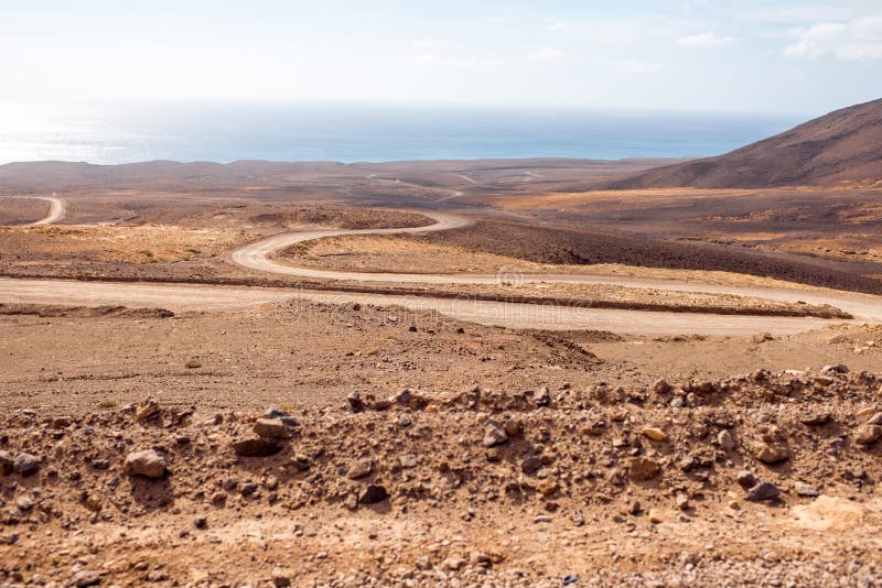 Deserted landscape with ground road on Fuerteventura island