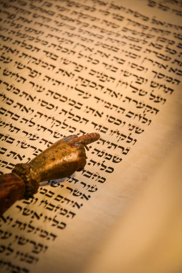 Torah scroll with a yad pointer. Torah scroll with a yad pointer