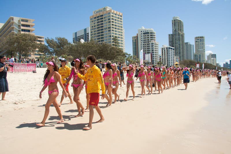 GOLD COAST, AUSTRALIA - OCTOBER 2, 2011: Unidentified participants march in successful Guinness World Record longest bikini parade on October 2,2011 in Gold Coast, Queensland, Australia. GOLD COAST, AUSTRALIA - OCTOBER 2, 2011: Unidentified participants march in successful Guinness World Record longest bikini parade on October 2,2011 in Gold Coast, Queensland, Australia