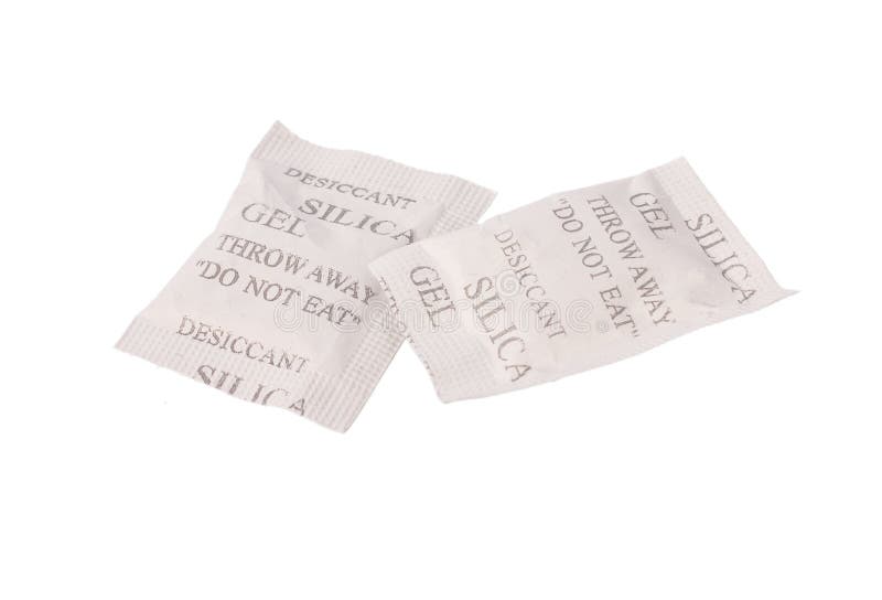 Desiccant Silica on the Pack. Closeup View. Packet of Silica Gel Buried