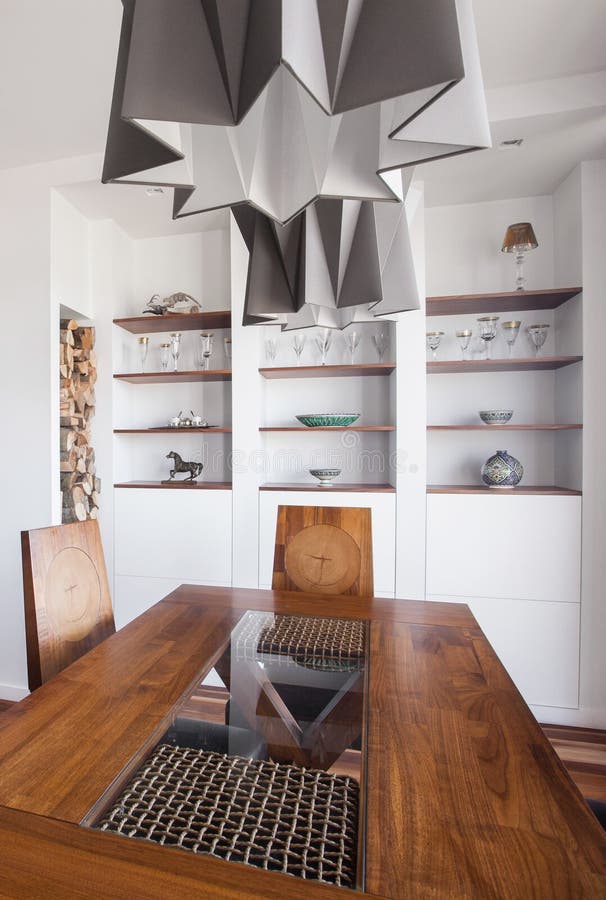 Designed Pendant and Wooden Table Stock Photo Image of design, chair