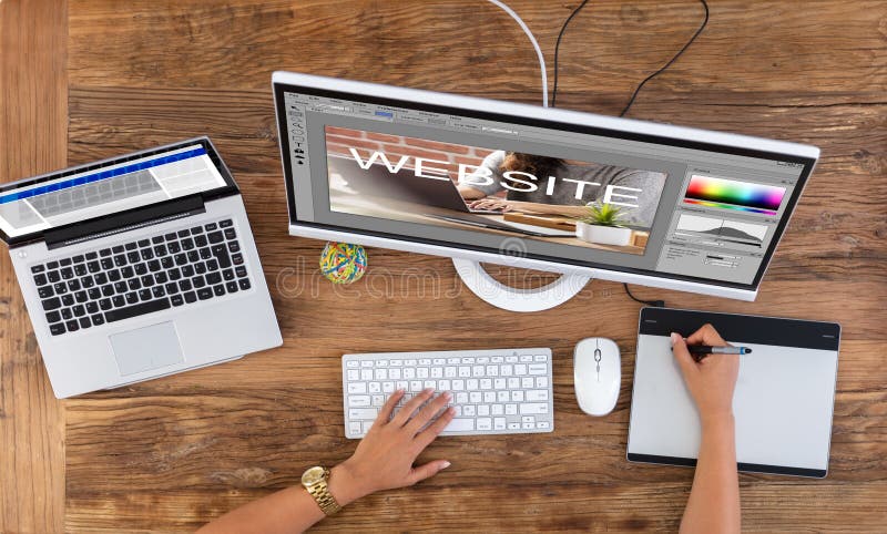 Designer Creating Website On Computer stock images Designer Creating Website On Computer stock images
