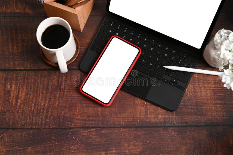 Designer Workplace with Tablet, Mobile Phone, Coffee Cup and Pencil