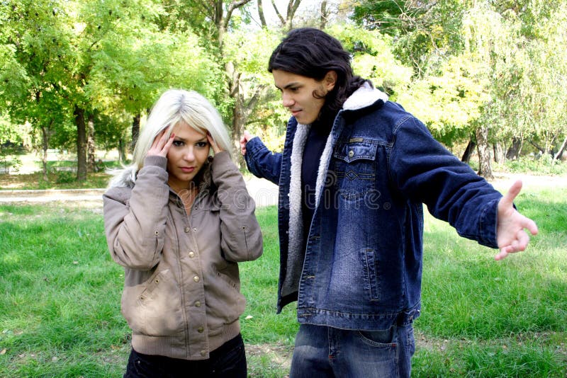 Young couple fight in the park. Young couple fight in the park