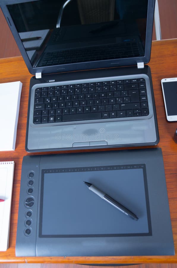 Desk and digital devices stock photos
