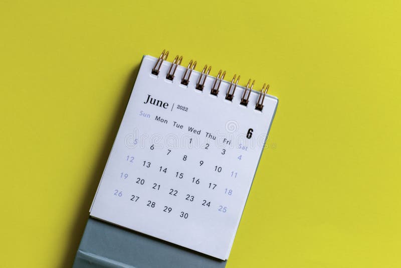 Desktop Calendar for June 2022 on a Yellow Background Stock Photo