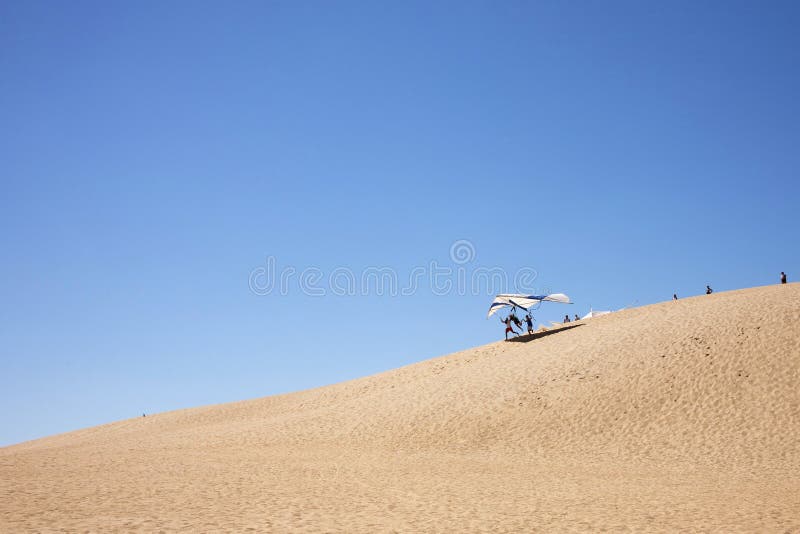 Deslizamento de cair das dunas de areia
