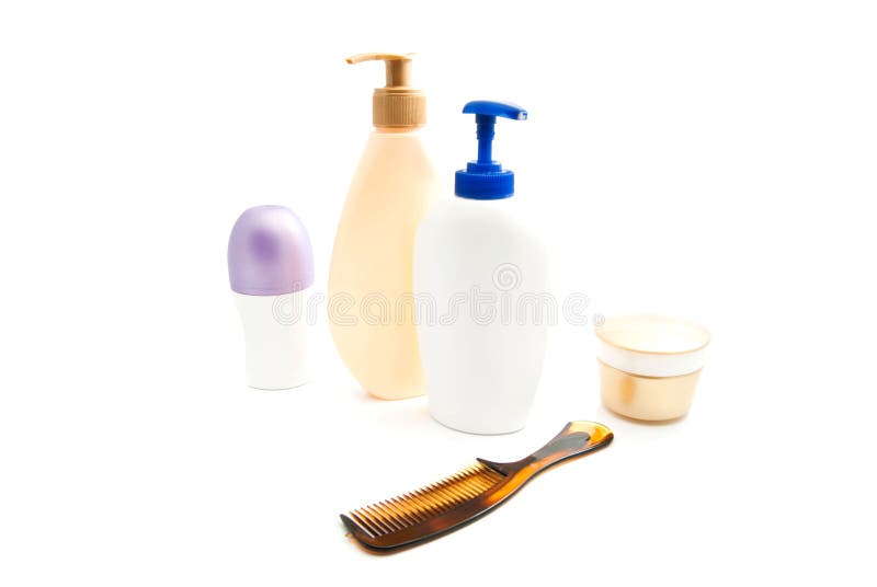 Desodorante, gel, crema y cepillo para el pelo foto de archivo Desodorante, gel, crema y cepillo para el pelo foto de archivo