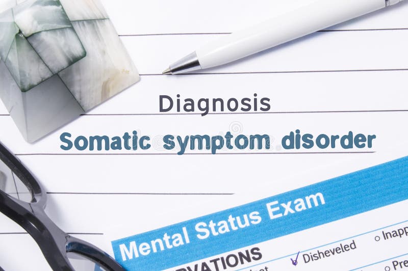 Psychiatric Diagnosis Somatic Symptom Disorder. Medical book or form with the name of diagnosis Somatic Symptom Disorder is on table of doctor surrounded by questionnaire to determine mental state. Psychiatric Diagnosis Somatic Symptom Disorder. Medical book or form with the name of diagnosis Somatic Symptom Disorder is on table of doctor surrounded by questionnaire to determine mental state