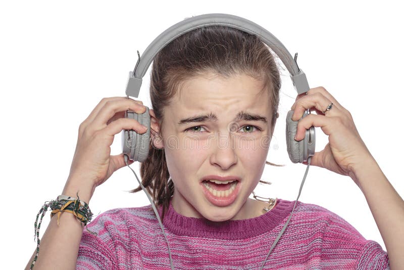 Desperate teenage girl takes off her headphones