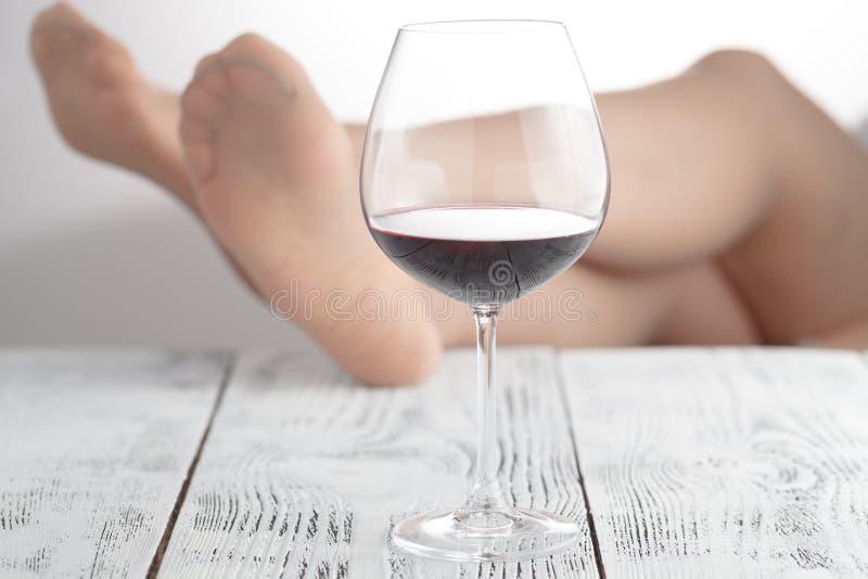 Despising conventions business woman relaxing in the office with his feet on the table