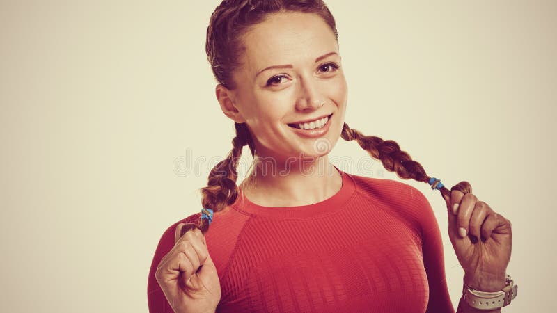 Desportista que guarda tranças foto de stock royalty free Desportista que guarda tranças foto de stock royalty free