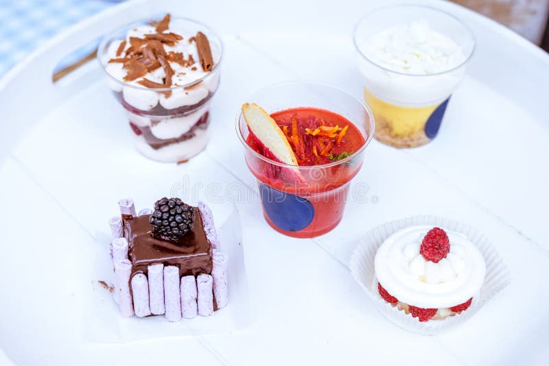 Dessert in cups and white plate royalty free stock images Dessert in cups and white plate royalty free stock images