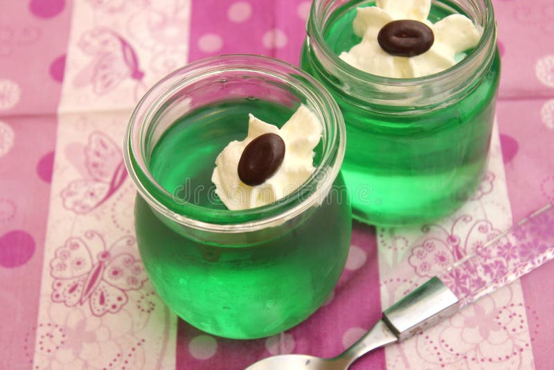 Green pudding with cream stock image. Image of jelly 111059505