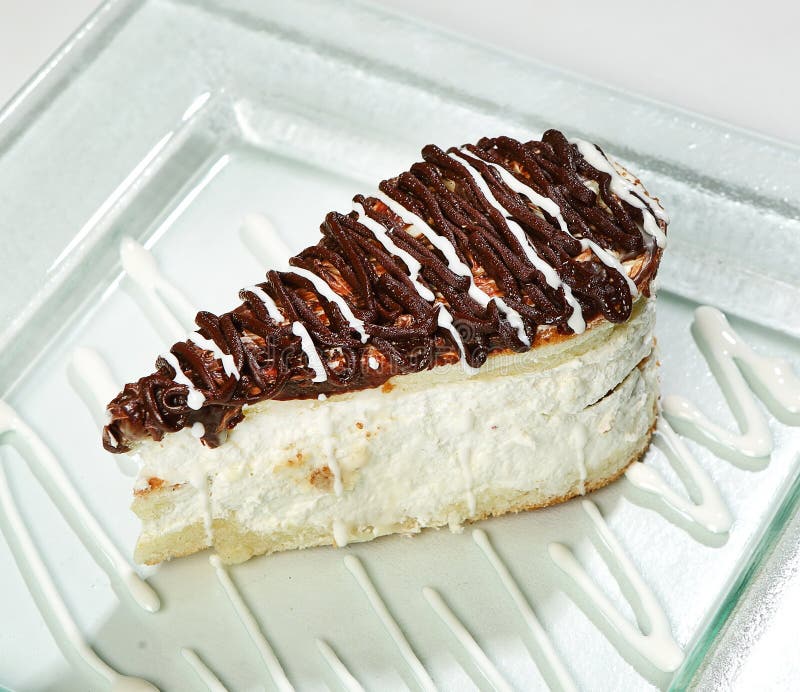 Dessert a Piece of Cake, a Biscuit and Cream, Closeup Stock Image