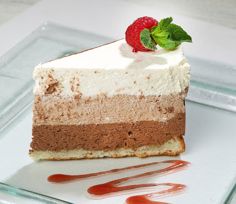 Dessert a Piece of Cake, a Biscuit and Cream, Closeup Stock Image