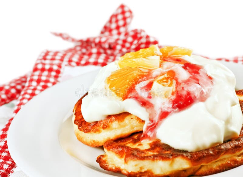 Dessert with strawberry jam and orange