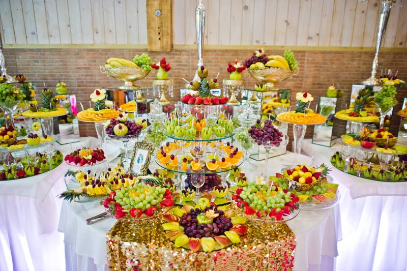 Dessert Table of Delicious Fruits on Wedding Reception Stock Photo