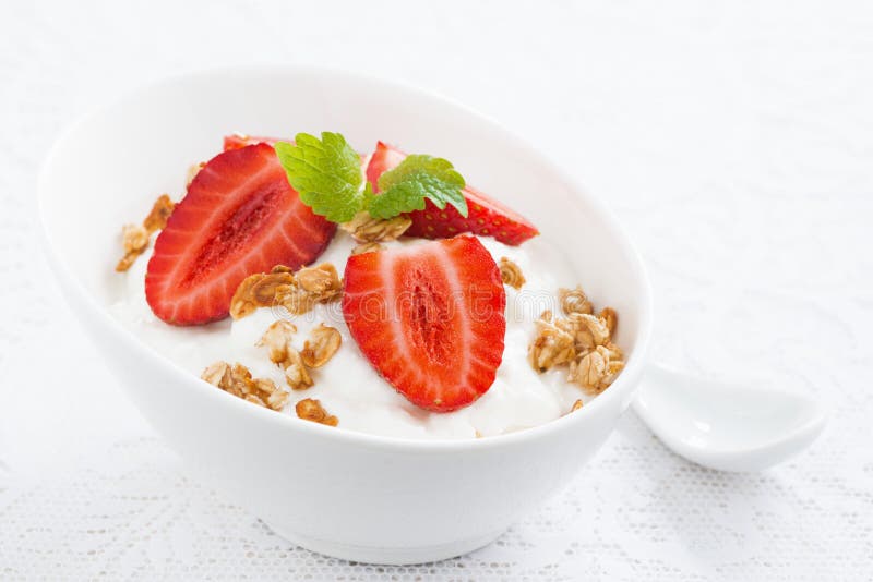 Dessert with whipped cream and fresh strawberries, close-up royalty free stock photo