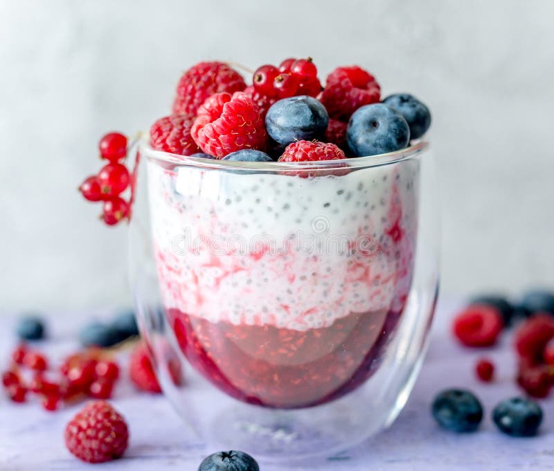 Dessert from Yogurt with Chia Seeds, Raspberries and Blueberries Stock ...