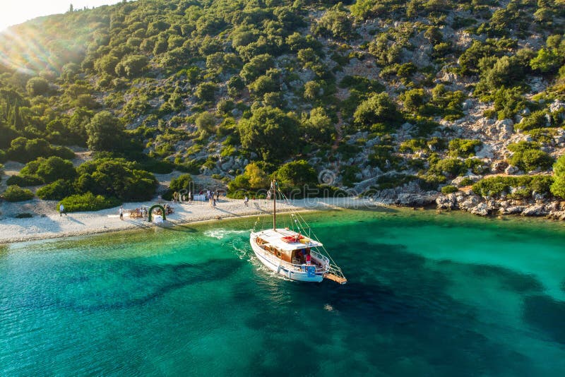 Destination wedding on a beach. Scenic aerial view of picturesque jagged coastline of Kefalonia with clear turquoise waters. Cephalonia, Ionian islands, Greece royalty free stock photo Destination wedding on a beach. Scenic aerial view of picturesque jagged coastline of Kefalonia with clear turquoise waters. Cephalonia, Ionian islands, Greece royalty free stock photo