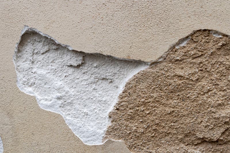 Destroyed Weathered Bonded Plaster Background. Texture of the Old