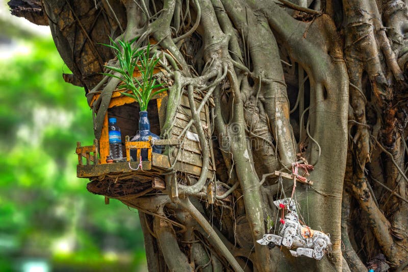 Miniature house for guardian spirit. A dedicated structure to honor the guardians of the land that is found in the Southeast Asian countries of Burma, Cambodia, Laos, and Thailand. Miniature house for guardian spirit. A dedicated structure to honor the guardians of the land that is found in the Southeast Asian countries of Burma, Cambodia, Laos, and Thailand.