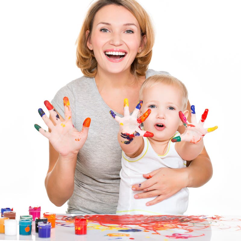 Happy young mother and child with painted hands - isolated on white. Happy young mother and child with painted hands - isolated on white.