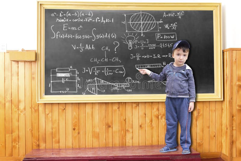 A minor child write on blackboard formulas. A minor child write on blackboard formulas