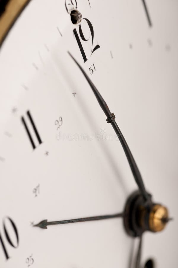 Detail of antique clock with Arabic numeral royalty free stock photo