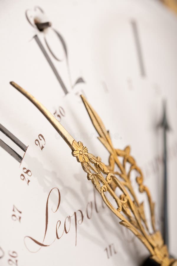 Detail of antique clock with Arabic numeral royalty free stock photography
