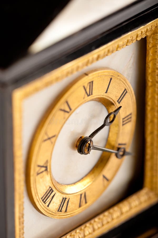 Detail of antique gold and black clock royalty free stock photo