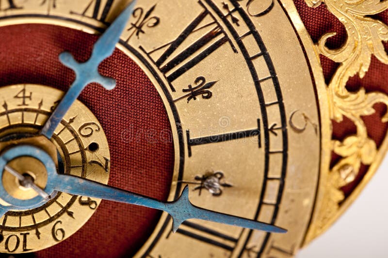 Detail of antique gold and red clock royalty free stock photography