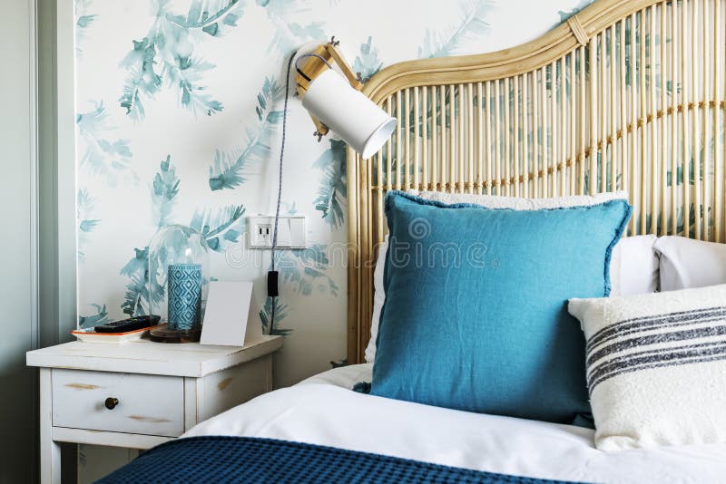 Detail of the bamboo and wicker headboard in a bedroom