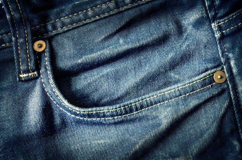 Detail of blue jeans pocket in vintage style royalty free stock photos