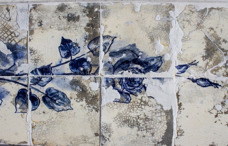 Detail of a blue rose on ceramic tiles wall from damaged facade of old house in Portugal royalty free stock photos Detail of a blue rose on ceramic tiles wall from damaged facade of old house in Portugal royalty free stock photos