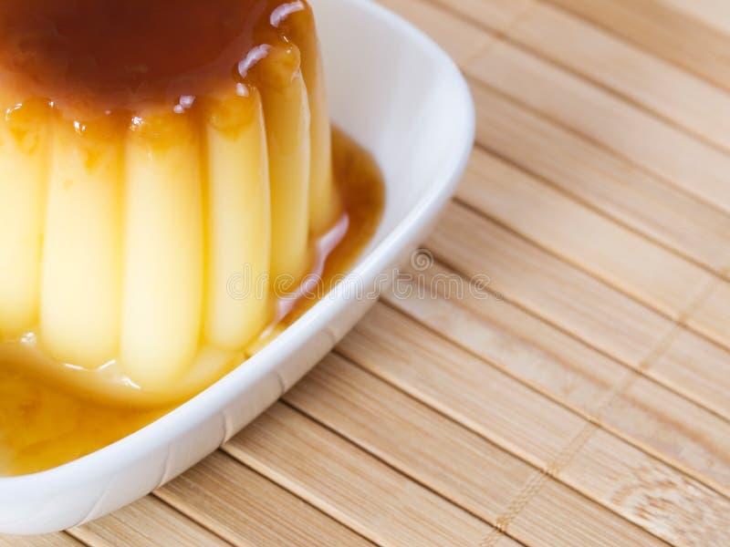 Caramel custard in a bowl stock image. Image of caramel 33800321