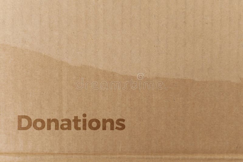 Detail of a Cardboard Box Written on Donations. Delivery Box Stock