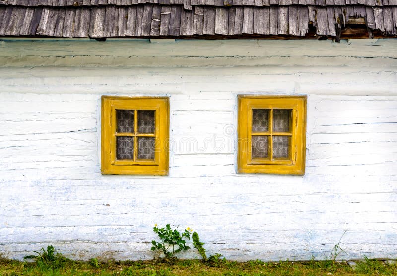 Detail of colorful windows on old traditional house